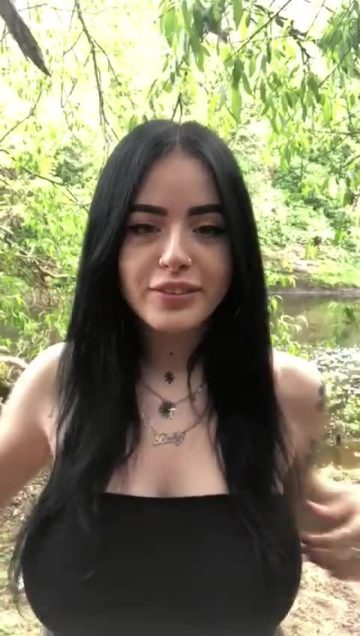 Goth girl flashing big tits (gif)