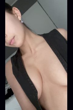 busty woman braless opening sexy top